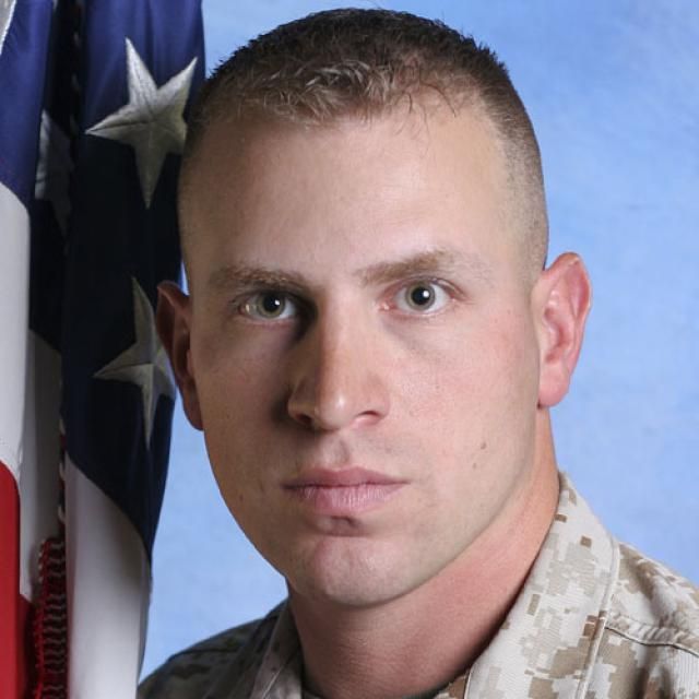 "Military induction buzz cut on oval face shape" (for types section image).