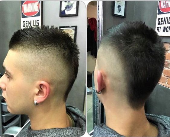 Illustration of short Mohawk buzz cut fusing punk roots with modern low-maintenance style.
