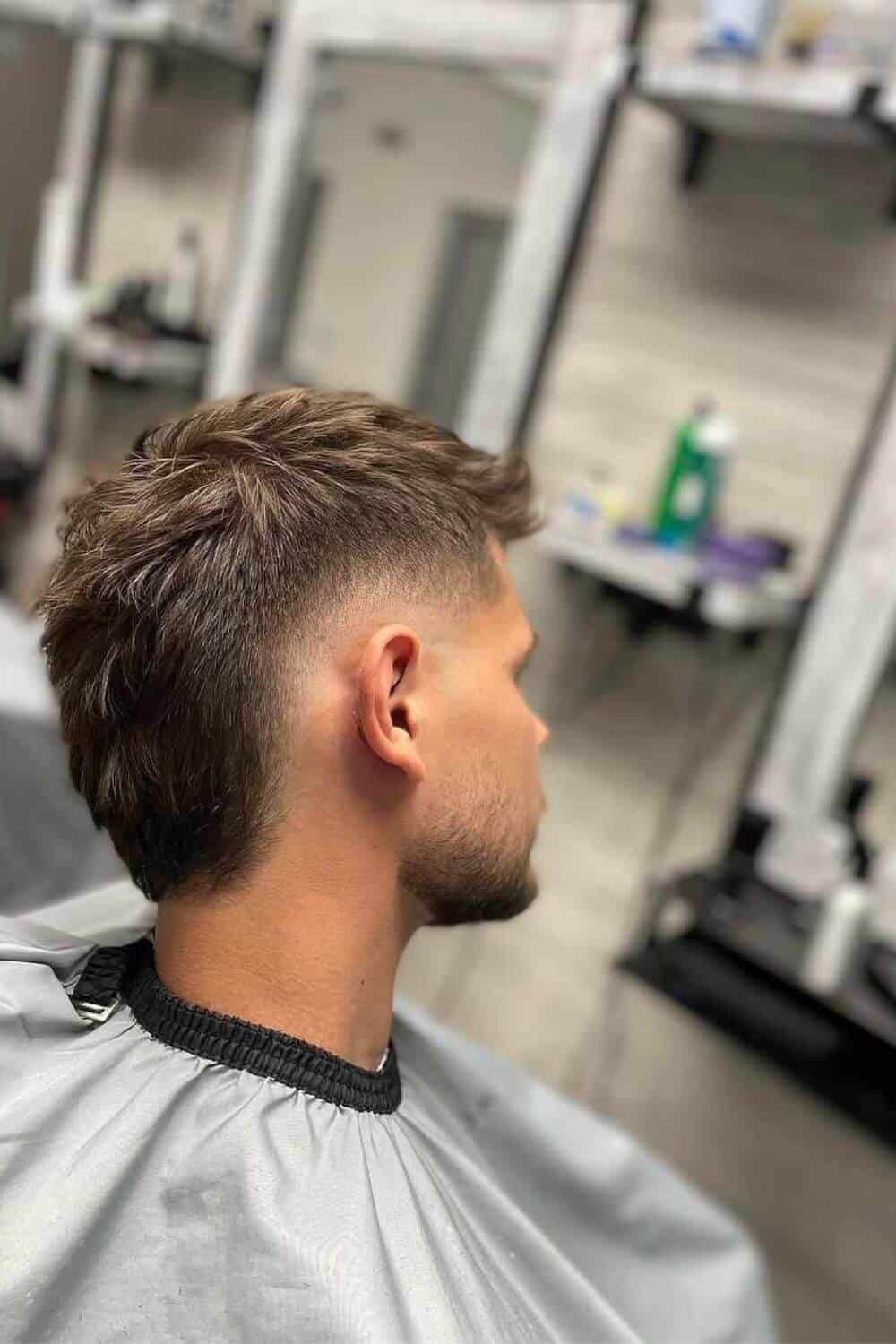 Short Mullet Example: "Short mullet hairstyle for men with fine hair and oval face"